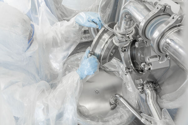 Stainless steel containment isolator