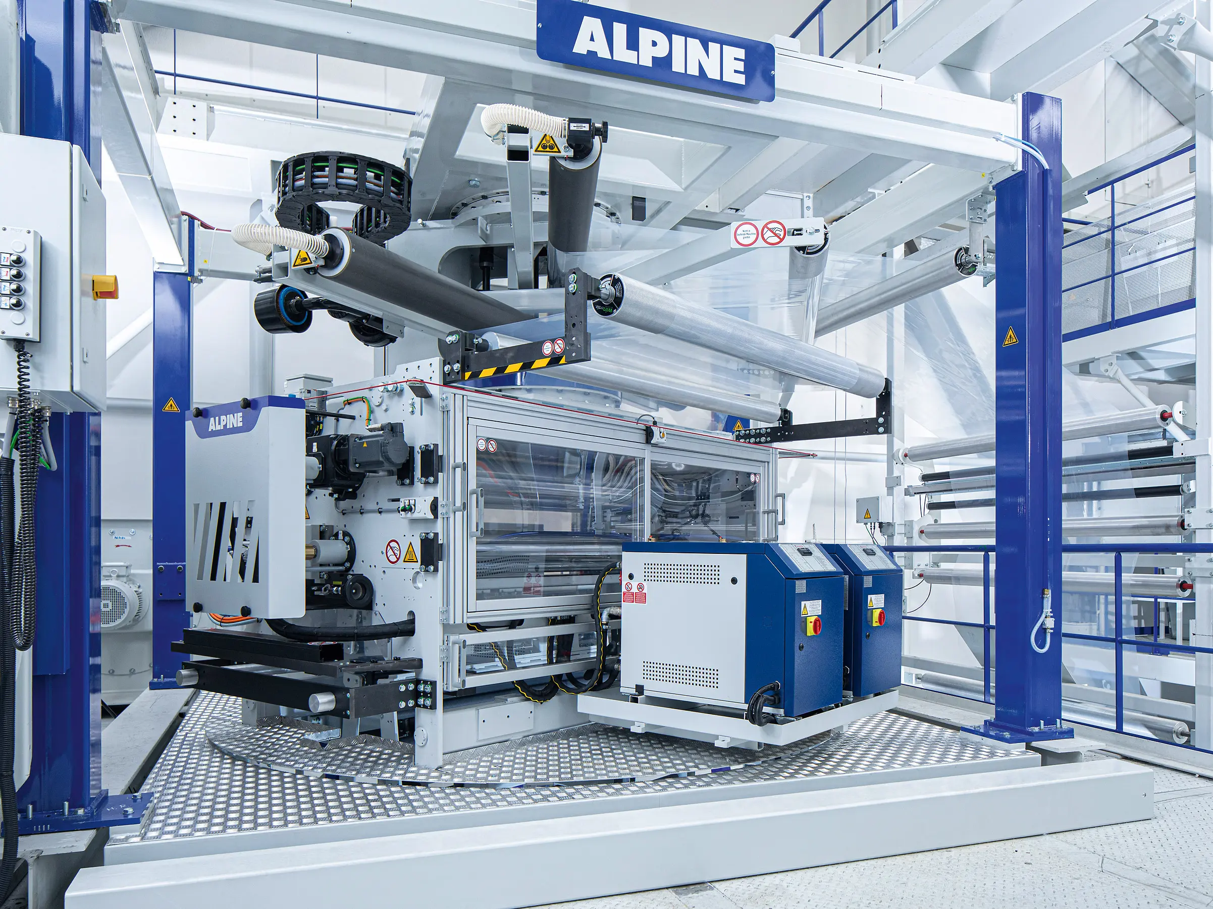 Oscillating take-off systems for blown film lines